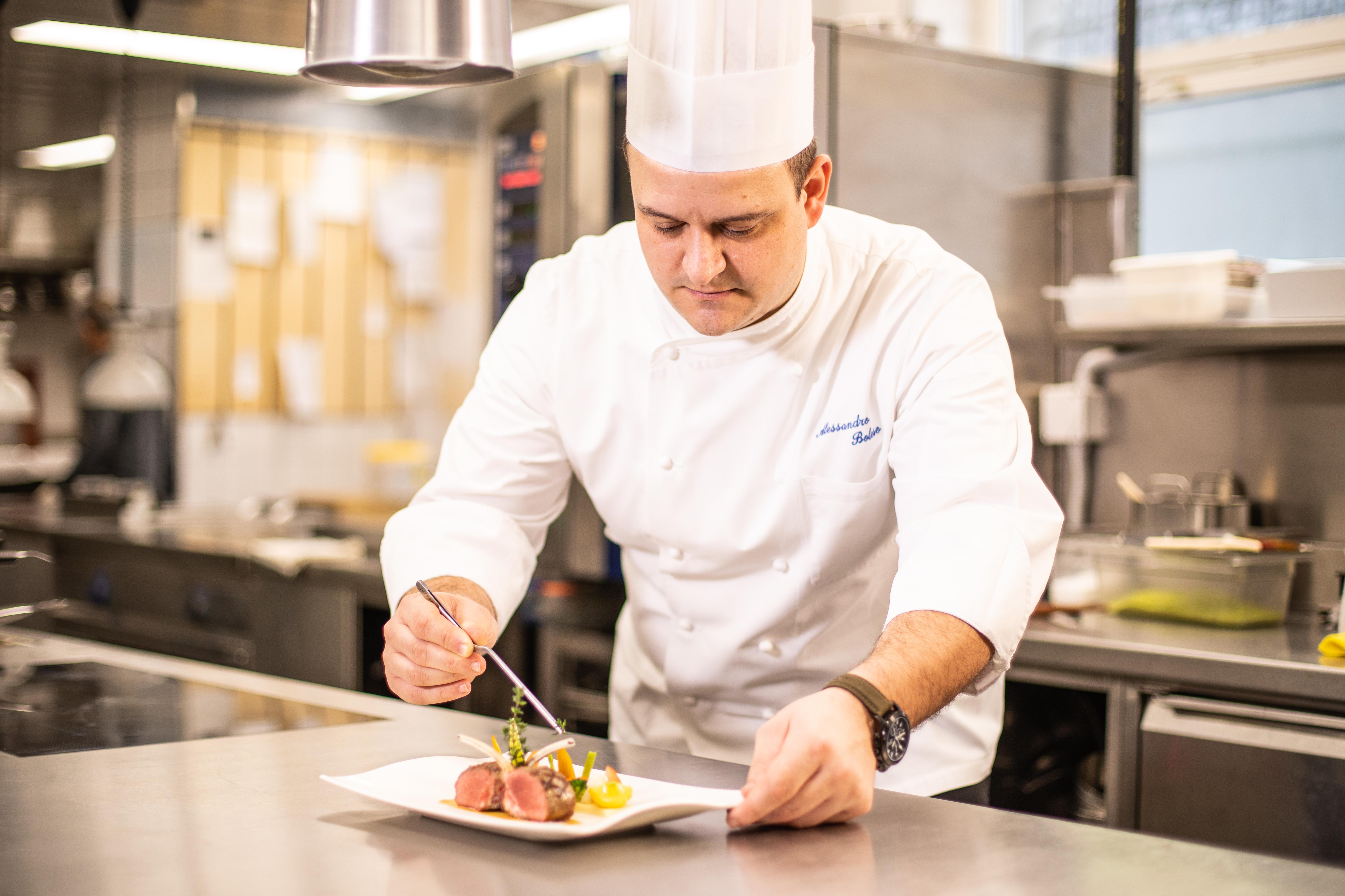 Grand Hotel Villa Castagnola Lugano Ngoại thất bức ảnh A chef preparing a meal