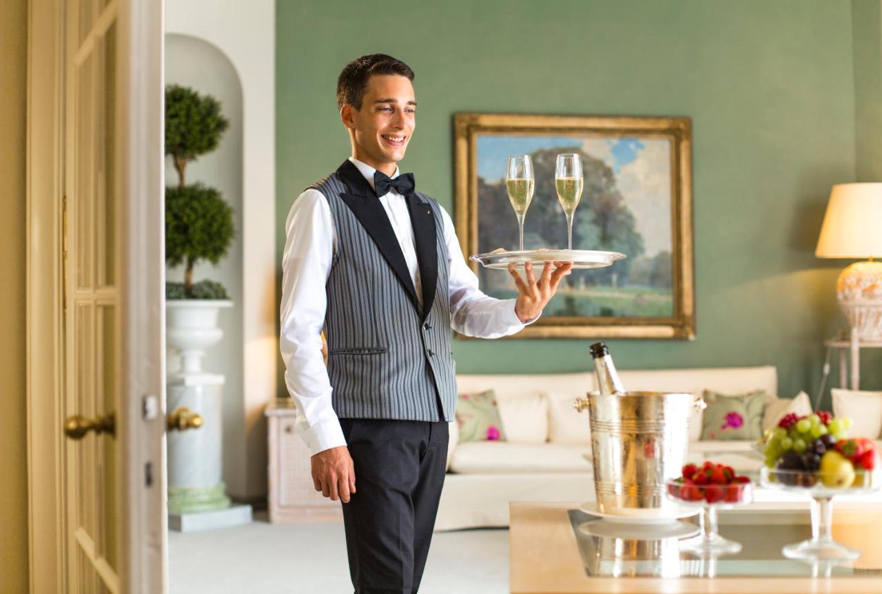 Grand Hotel Villa Castagnola Lugano Ngoại thất bức ảnh A butler serving champagne